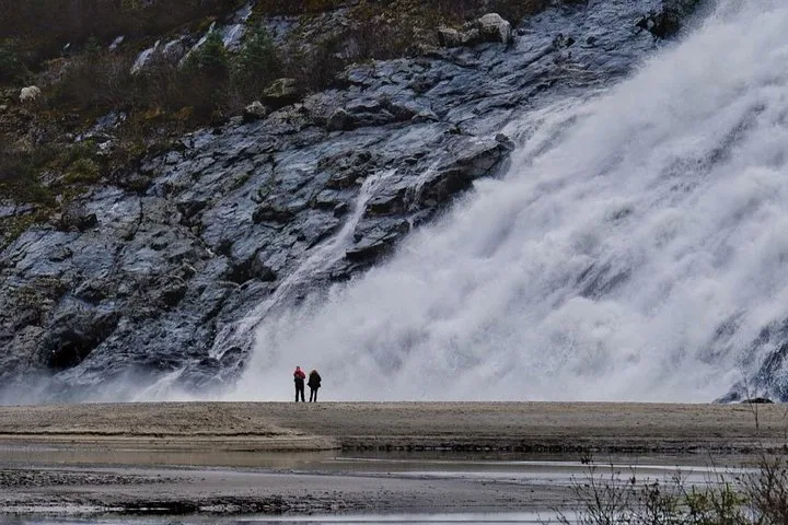 Nugget Falls pouring onto the shore